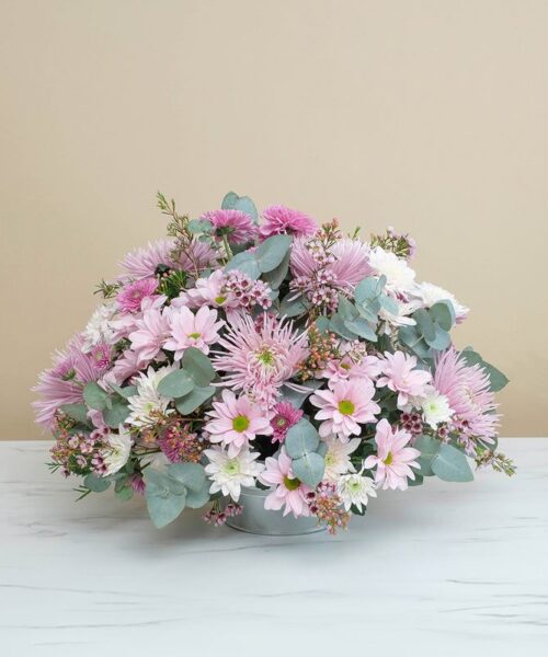 Composition florale rose pour deuil