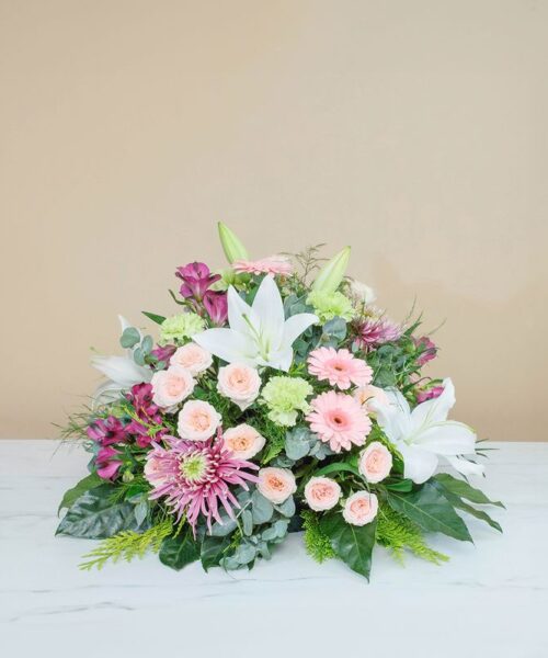 Composition florale pastelle pour deuil